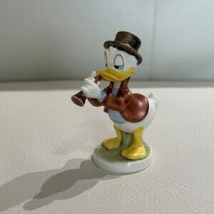 Goebel Disney "Donald Duck With Clarinet" as Hummel #85 "Serenade" Figurine